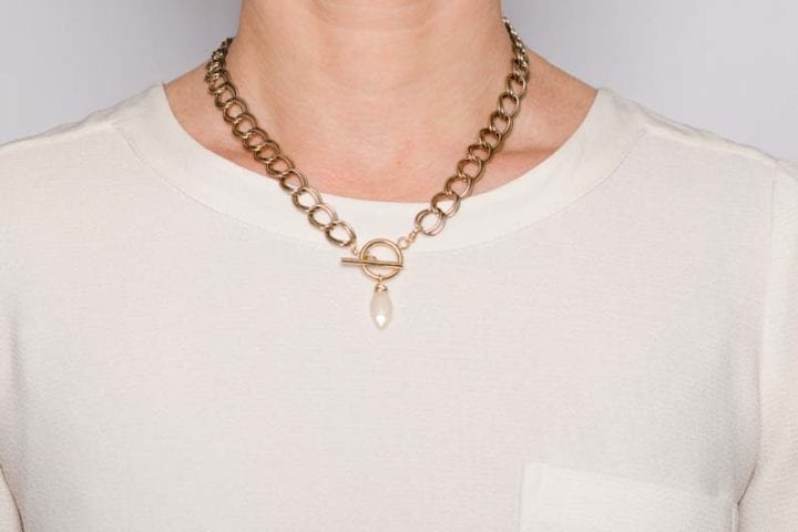pearl chalcedony leaf antique toggle necklace on model with stone