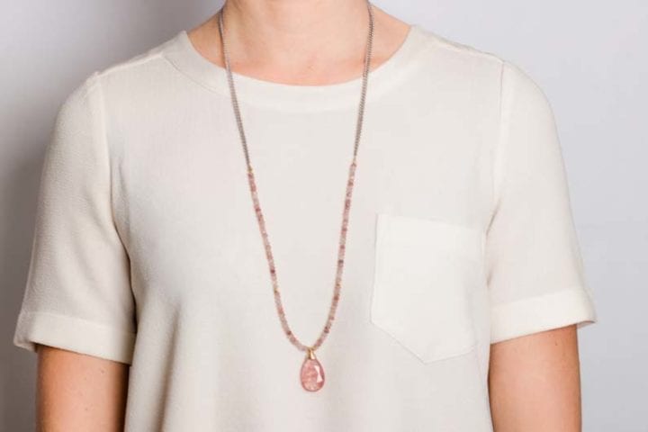 strawberry quartz strung long necklace on model