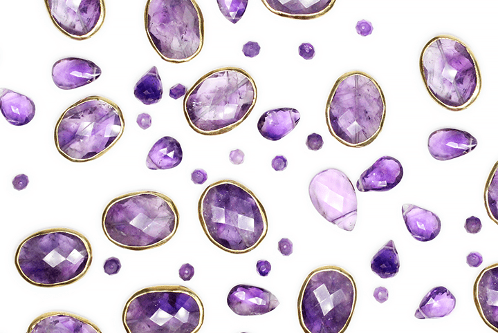 Amethyst Birthstone Stones Scattered on White Background | Handcrafted Bloom Jewelry